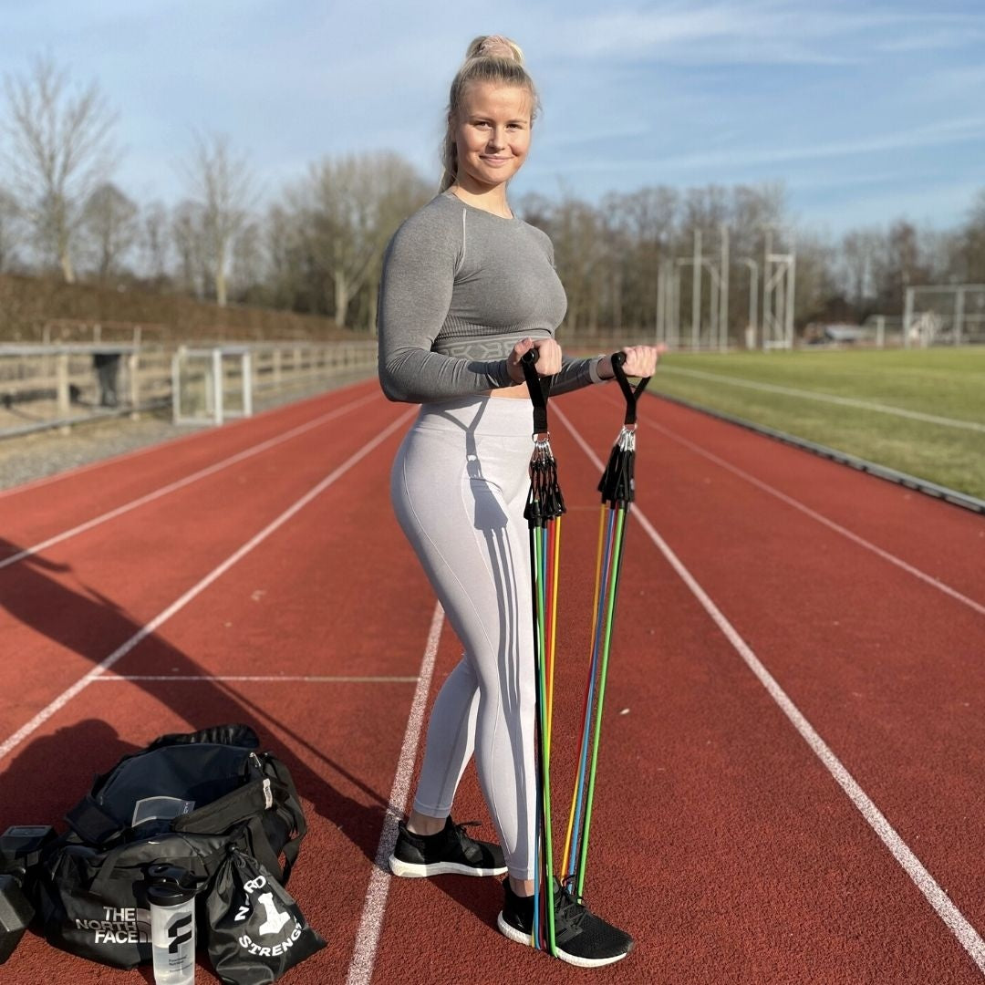 Tube-Set PRO - hochwertiges 5-in-1 Set Fitnessbänder mit Griffen und Türanker - muskelzone